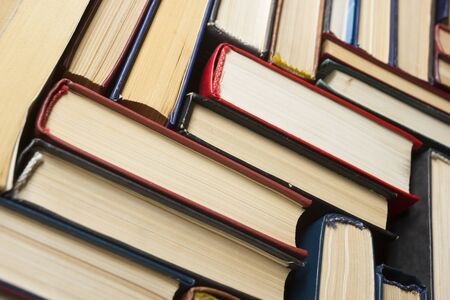 Stack of books background. many books piles.の写真素材