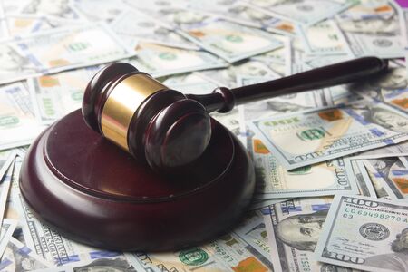 Judges Or Auctioneer Gavel On The Dollar Cash Background, Top View, Close-Up. Concept For Corruption, Bankruptcy, Bail, Crime, Bribing, Fraud, Auction Bidding, Fines.の写真素材