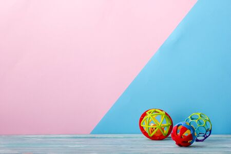 Colorful kids toys frame on wooden background. Top view. Flat lay. Copy space for textの写真素材