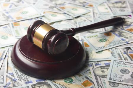 Judges Or Auctioneer Gavel On The Dollar Cash Background, Top View, Close-Up. Concept For Corruption, Bankruptcy, Bail, Crime, Bribing, Fraud, Auction Bidding, Finesの写真素材