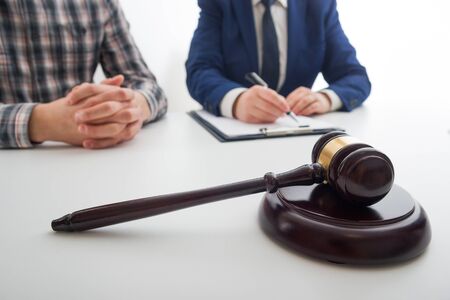 Law, advice and Legal services concept. Lawyer and attorney having team meeting at law firm