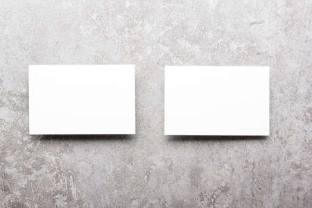 White business cards blank on textured background. Identity design, corporate templates, company style. Flat layの写真素材