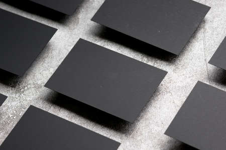 Black business cards blank on textured background. Identity design, corporate templates, company style. Flat layの写真素材