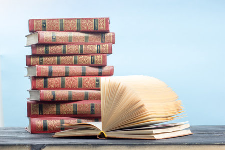 Open book, hardback books on wooden table. Back to school. Copy spaceの写真素材