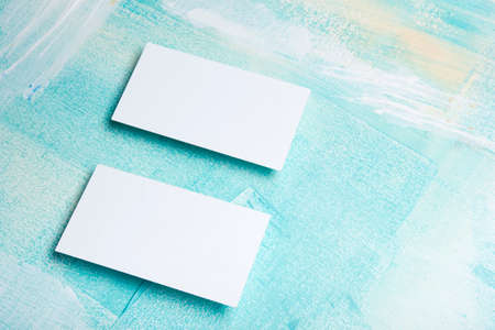 Business cards blank. Mockup on color background. Flat Lay. copy space for text.の写真素材