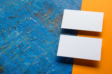 Business cards blank. Mockup on color background. Flat Lay. copy space for text.の写真素材