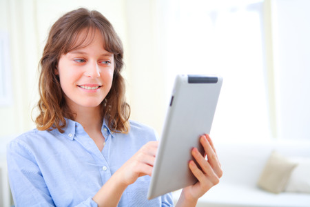 View of a young business woman using a tabletの写真素材