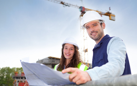 View of Co-workers working on a construction site