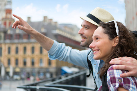 View of a Young attractive couple on holidays in cityの写真素材