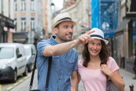View of a Young couple visiting city during holidaysの写真素材