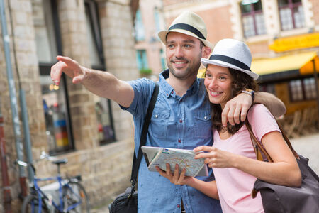 View of a Young couple of tourists visiting cityの写真素材