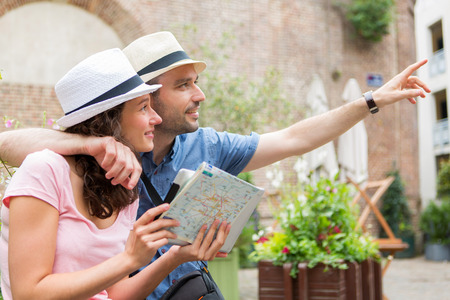 View of a Young couple of tourists visiting cityの写真素材