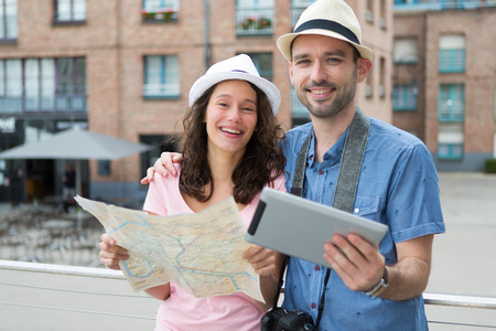 View of a Young couple of tourists visiting cityの写真素材