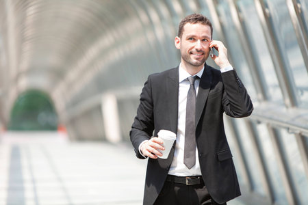 View of a Businessman having a call during a breakの写真素材
