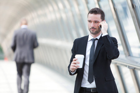 View of a Businessman having a call during a breakの写真素材