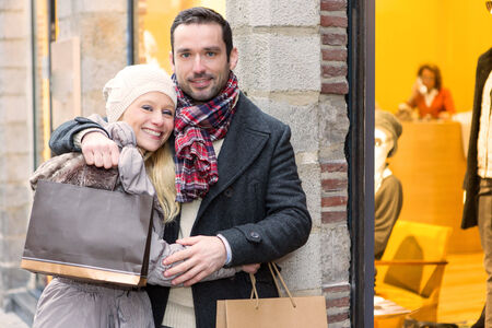 View of a Young attractive couple with shopping bagsの写真素材