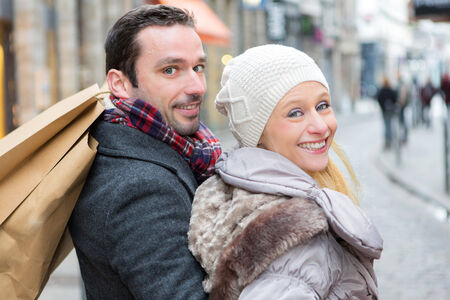 View of a Young attractive couple with shopping bagsの写真素材
