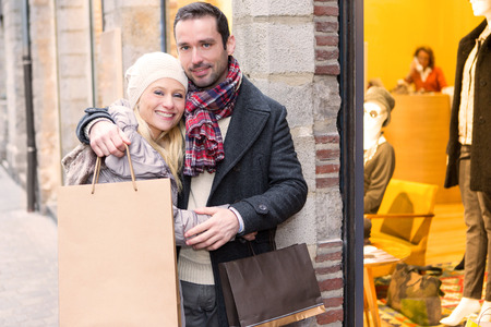 View of a Young attractive couple with shopping bagsの写真素材