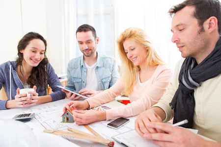 View of Architect students finalysing their house construction projectの写真素材