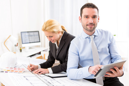 View of a Young attractive engineer working at the officeの写真素材
