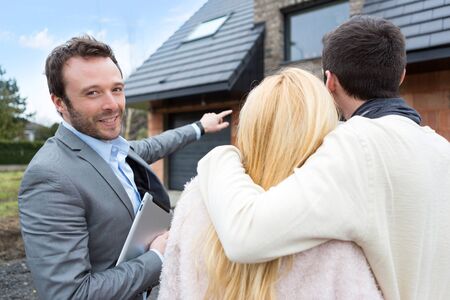 View of a Real estate agent shows details to customersの写真素材