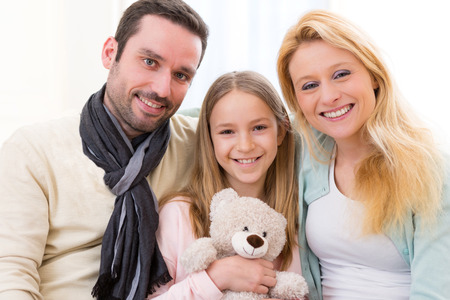 View of a happy family in a sofaの写真素材
