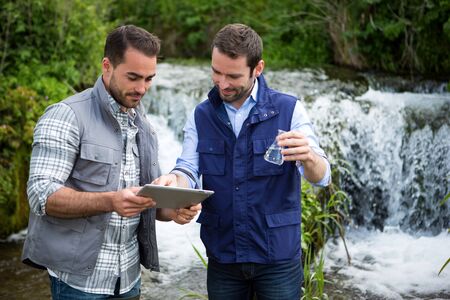 View of a Scientist and biologist working together on water analysisの写真素材