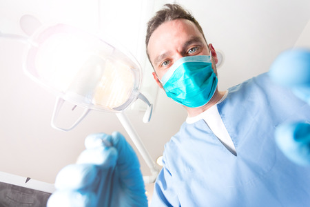 Point of View from patient of a dentist at workの写真素材