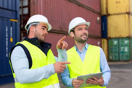 View of a Worker explaining to supervisor security system setting upの写真素材