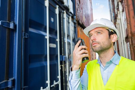 View of a Young attractive docker checking security systemの写真素材