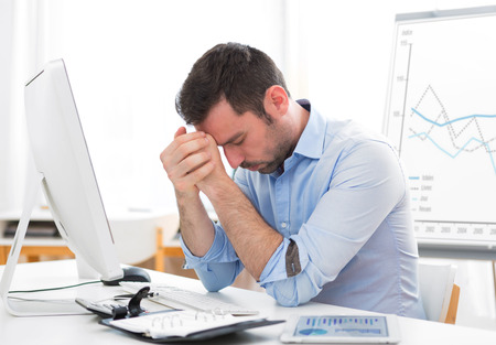 View of a Young attractive business got headache because of burn outの写真素材