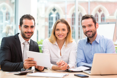 View of a Group of business people working together at the officeの写真素材