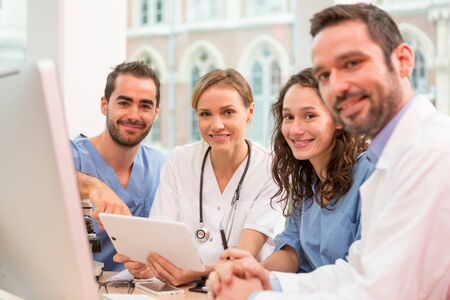 View of a Medical team working at the hospital all togetherの写真素材