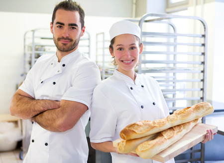 View of a Team of bakers working at the bakeryの写真素材