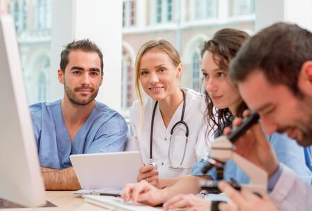 View of a Medical team working at the hospital all togetherの写真素材