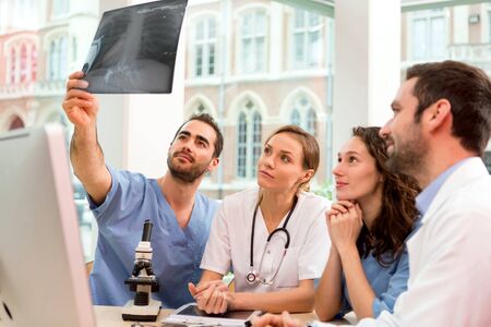 View of a Medical team working at the hospital all togetherの写真素材