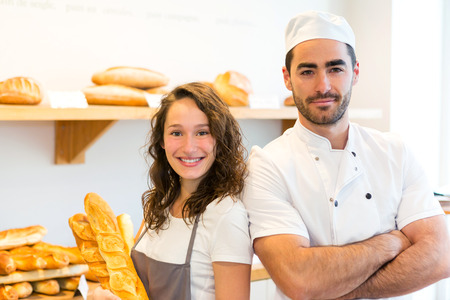 View of a Team of bakers working at the bakeryの写真素材