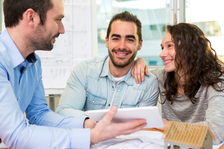 View of a Young attractive people meeting real estate agent at the officeの写真素材