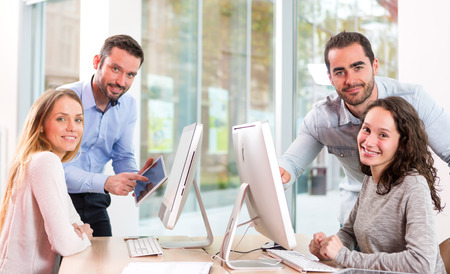View of a Young attractive people taking a training course with formatorの写真素材