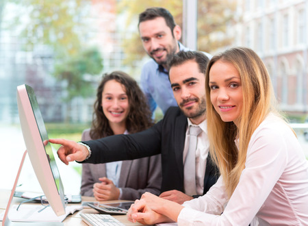 View of a Group of business people working together at the officeの写真素材