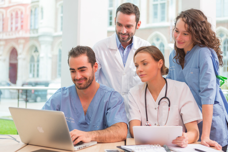 View of a Medical team working at the hospital all togetherの写真素材