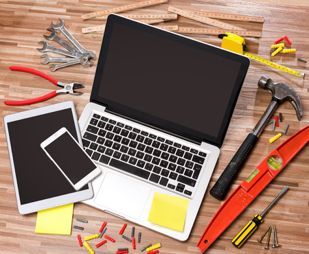 View of a Wood handyman's desk in high definition with laptop, tablet and mobileの写真素材
