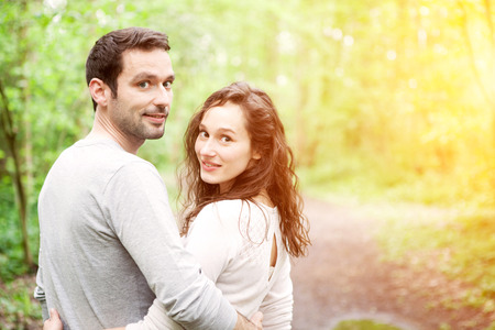 View of a Portrait of a young happy couple in the natureの写真素材