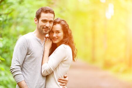 View of a Portrait of a young happy couple in the natureの写真素材