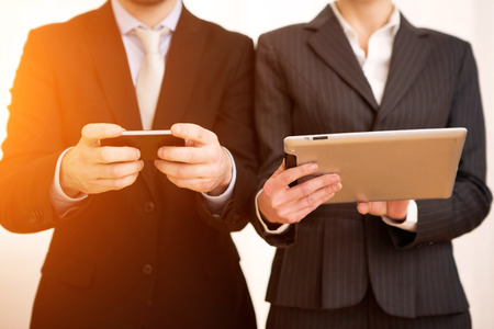 View of a Business man using tablet and smartphoneの写真素材