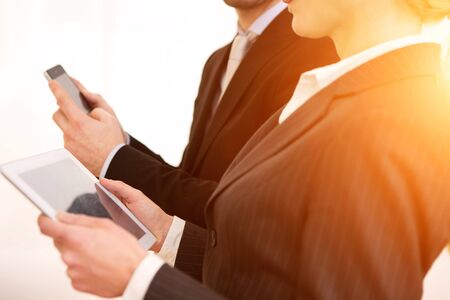 View of a Business man using tablet and smartphoneの写真素材