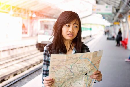 View of a Young attractive asian tourist visiting Parisのeditorial素材