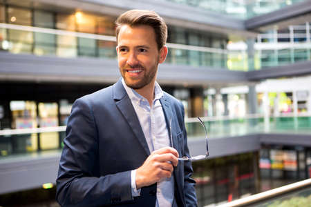 View of a Young attractive business man with glassesの写真素材