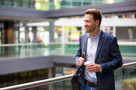 VIew of a Young attractive business man drinking coffeeの写真素材
