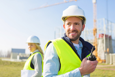 View of a team of two workers on a construction siteの写真素材